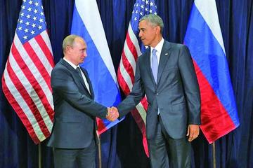 El presidente rudo Vadímir Putin estrecha la mano de su par estadounidense; Putin retorna tras diez años a esta reunión