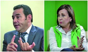 Los postulantes Jimmy Morales y Sandra Torres.
