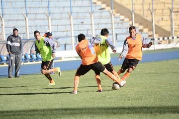 El primer plantel durante un entrenamiento.