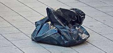 Hallan cadáver de bebé en bolsa de desperdicio