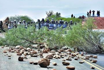 Cooperativistas dejan el cerro y retomarán bloqueo de una garita