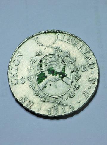 El anverso y la leyenda de una moneda.