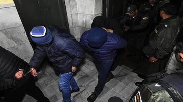 Dos de los implicados, tras la audiencia de medidas cautelares.