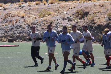 Los jugadores de la banda roja durante su entrenamiento.
