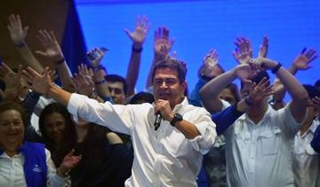 El actual mandatario, Juan Orlando Hernández, celebró con sus seguidores en Tegucigalpa.