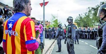 Gobierno repliega a fuerzas de seguridad en Cataluña