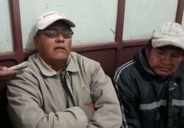 Dos de los cuatro choferes detenidos.