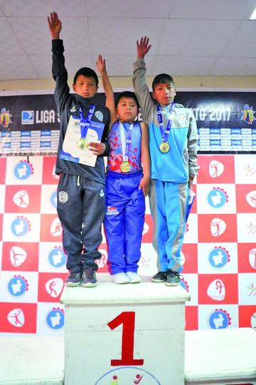 Los campeones Joel Pérez, Miguel Castro y Damian Troncoso.