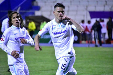 Carlos Gómez y Juan Miguel Callejón festejan el gol.