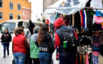 Crece la venta de gorras, chalinas y guantes.