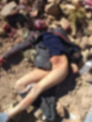Sus cuerpos en el cerro.