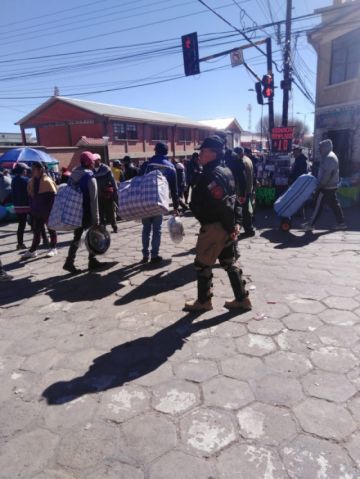 Los feriantes tienen su propio cuerpo de seguridad.