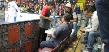 En el coliseo.