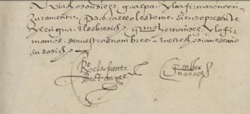 Las firmas al final del documento son del sacerdote y el traductor.