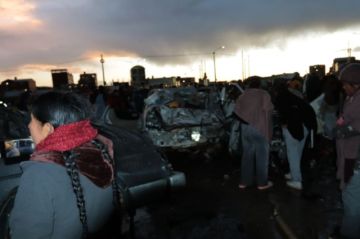 Aprehenden a 12 personas por robo de billetes que transportaba el avión accidentado