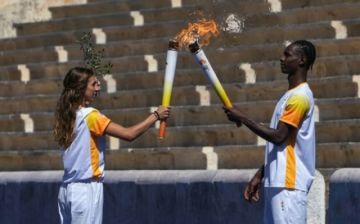 Encienden la llama olímpica de los IV Juegos de la Juventud en Dakar