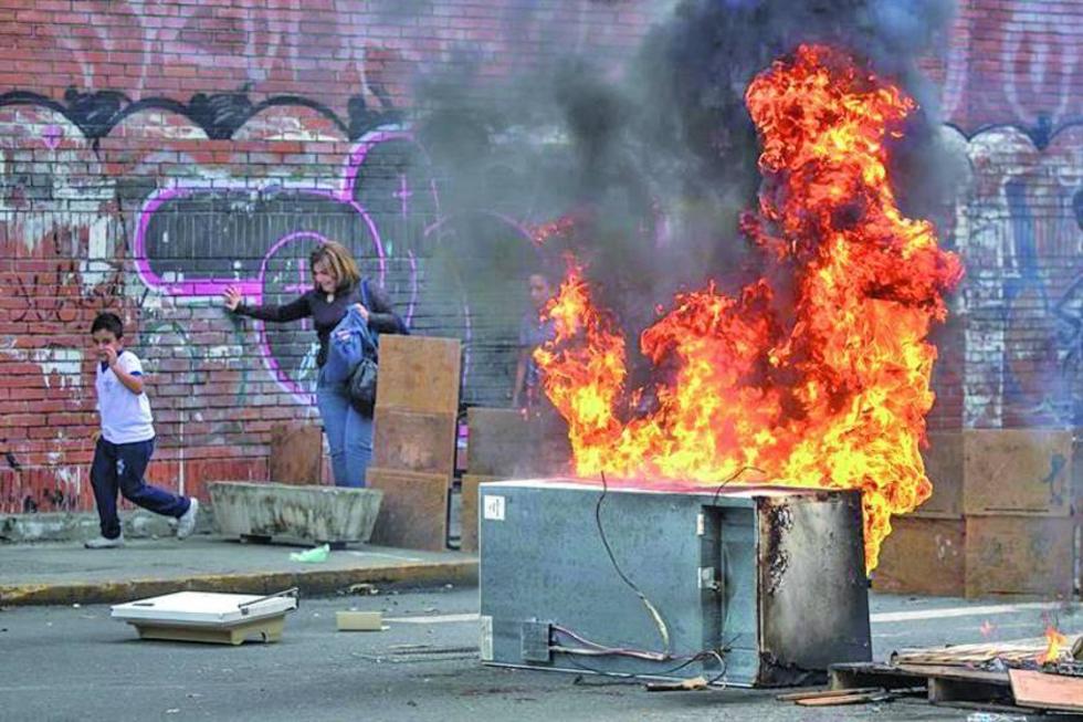 El chavismo y la oposición en Venezuela  toman las calles