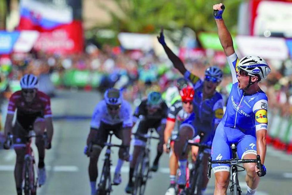 Lampaert sorprende en un kilómetro de oro y se viste de rojo en la Vuelta a España