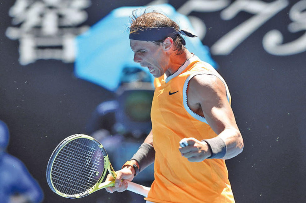 Nadal y Federer sonríen tras ganar sus duelos