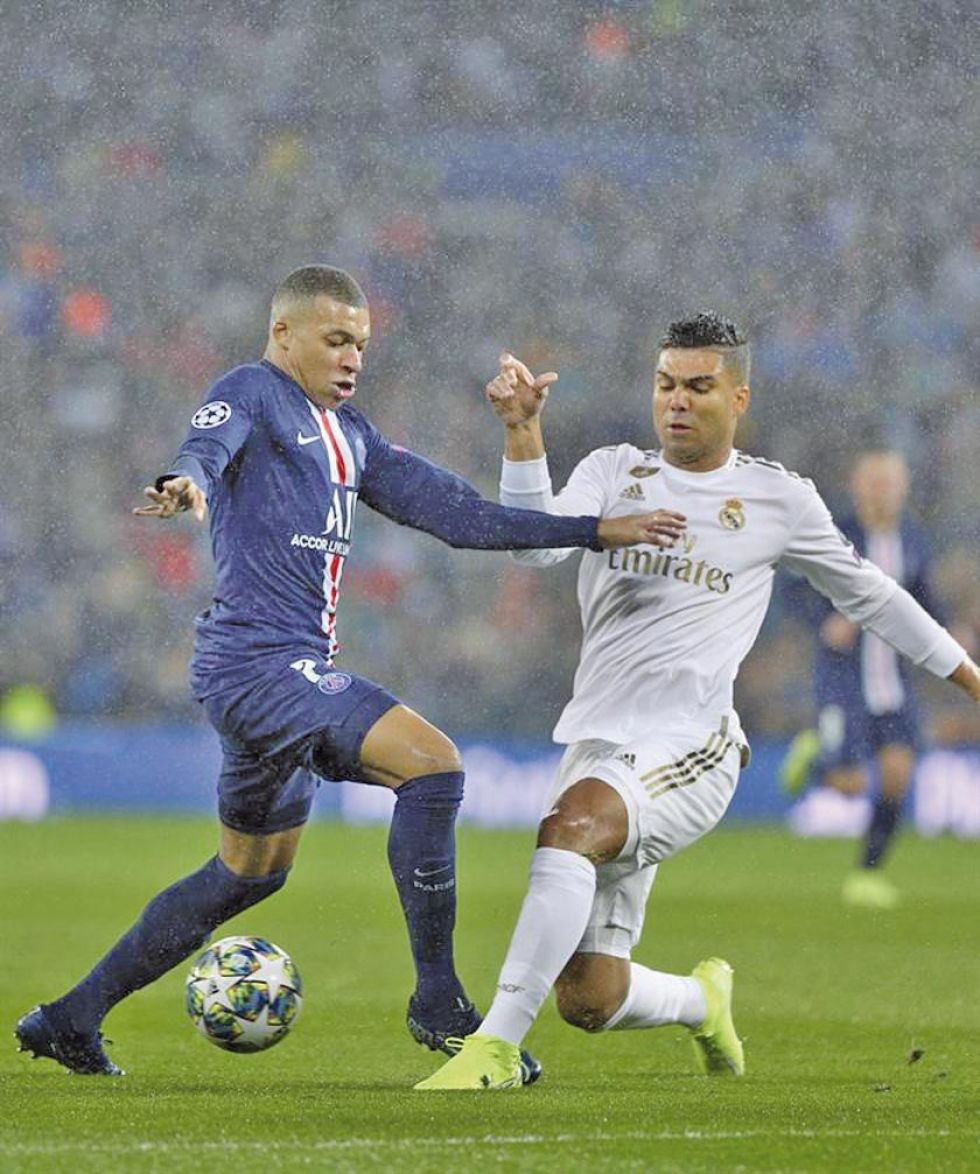 Real Madrid y París Saint-Germain se reparten honores
