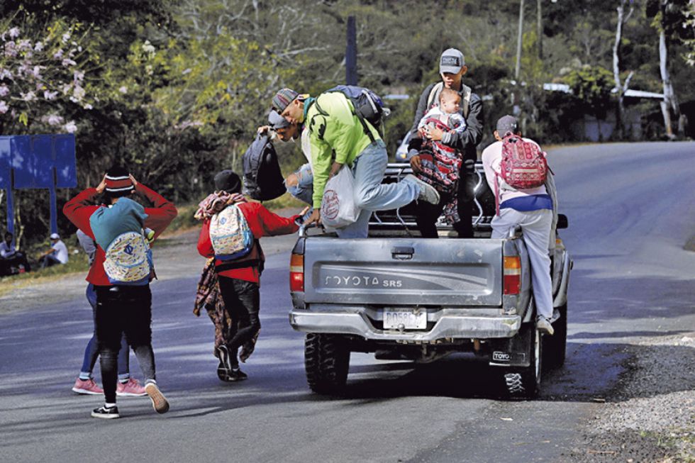 Inmigrantes hondureños cerca de llegar a México