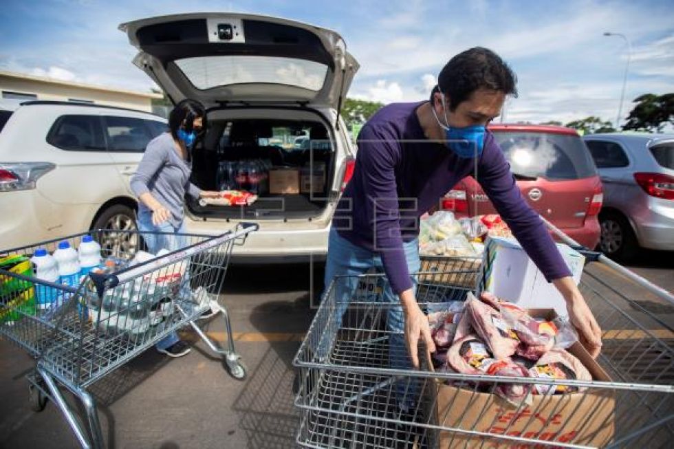 América busca activarse ante anuncios de recesión e incremento de contagios
