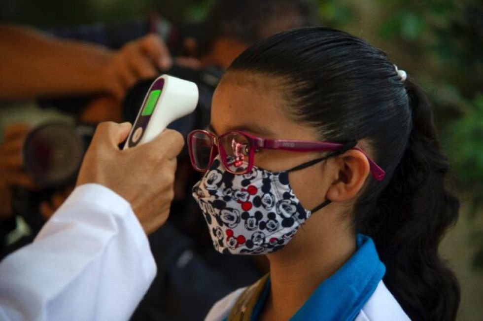 Con “emoción y nervios”, estudiantes mexicanos vuelven a las aulas