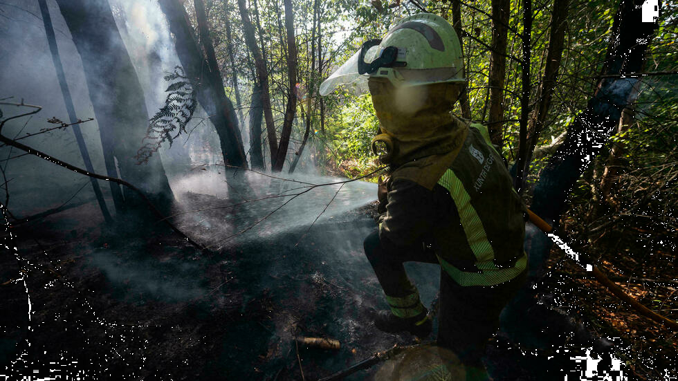 Bomberos controlan fuego en Cataluña pero el peligro por el calor sigue
