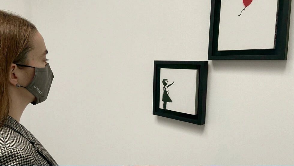 Díptico de la "Niña con globo" de Banksy subastado por 4,3 millones de dólares
