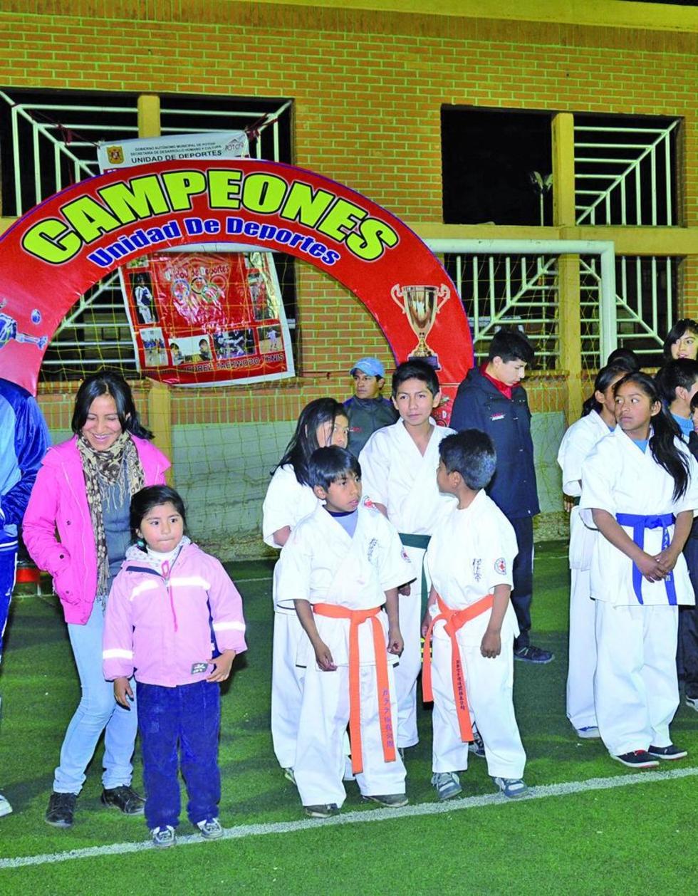Lo ganadores de ajedrez y taekwondo