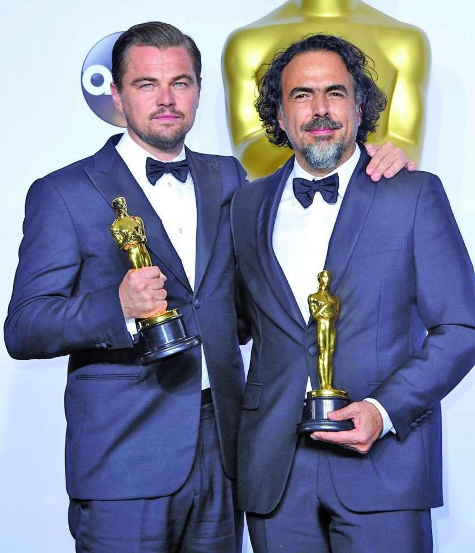 Leonardo DiCaprio y Alejandro Gonzalez Iñárritu con los galardones.